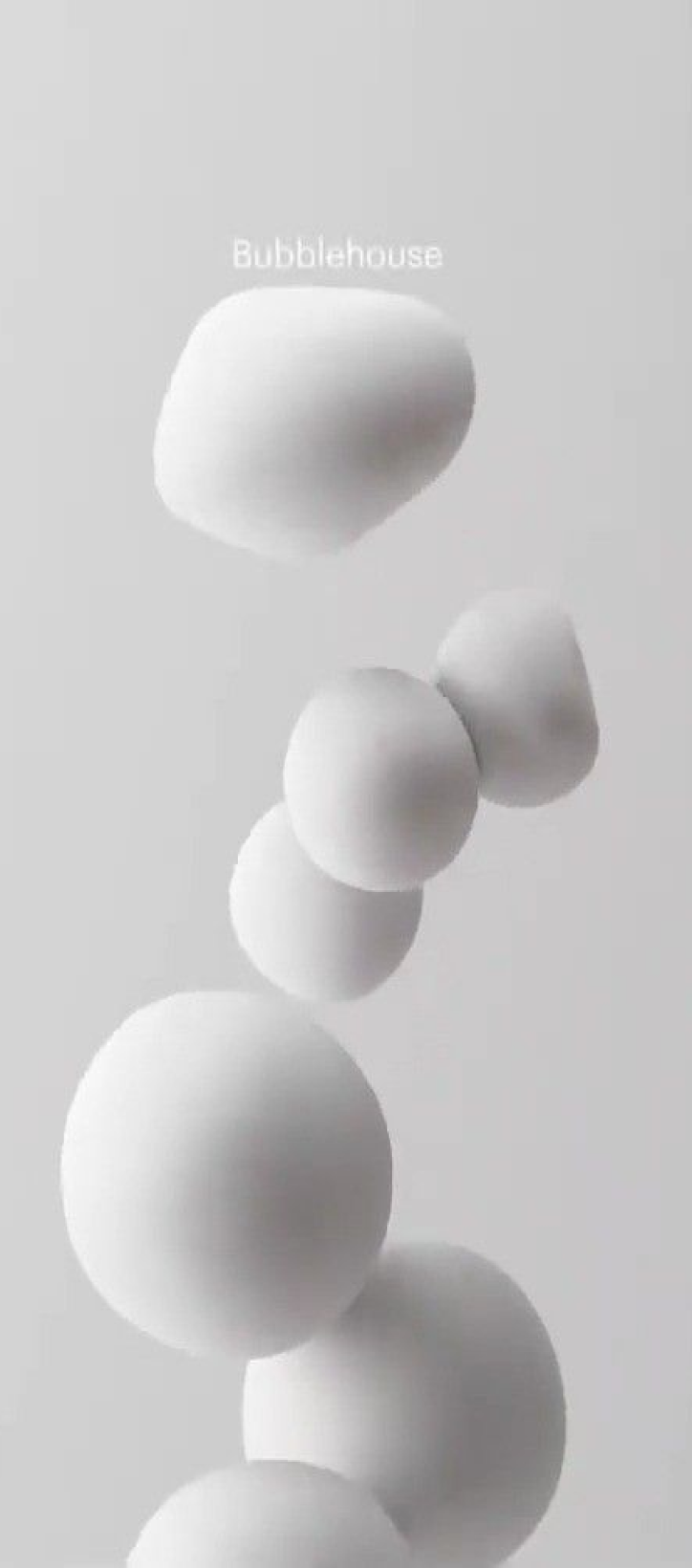 Imagen de burbujas blancas sobre fondo blanco minimalista.